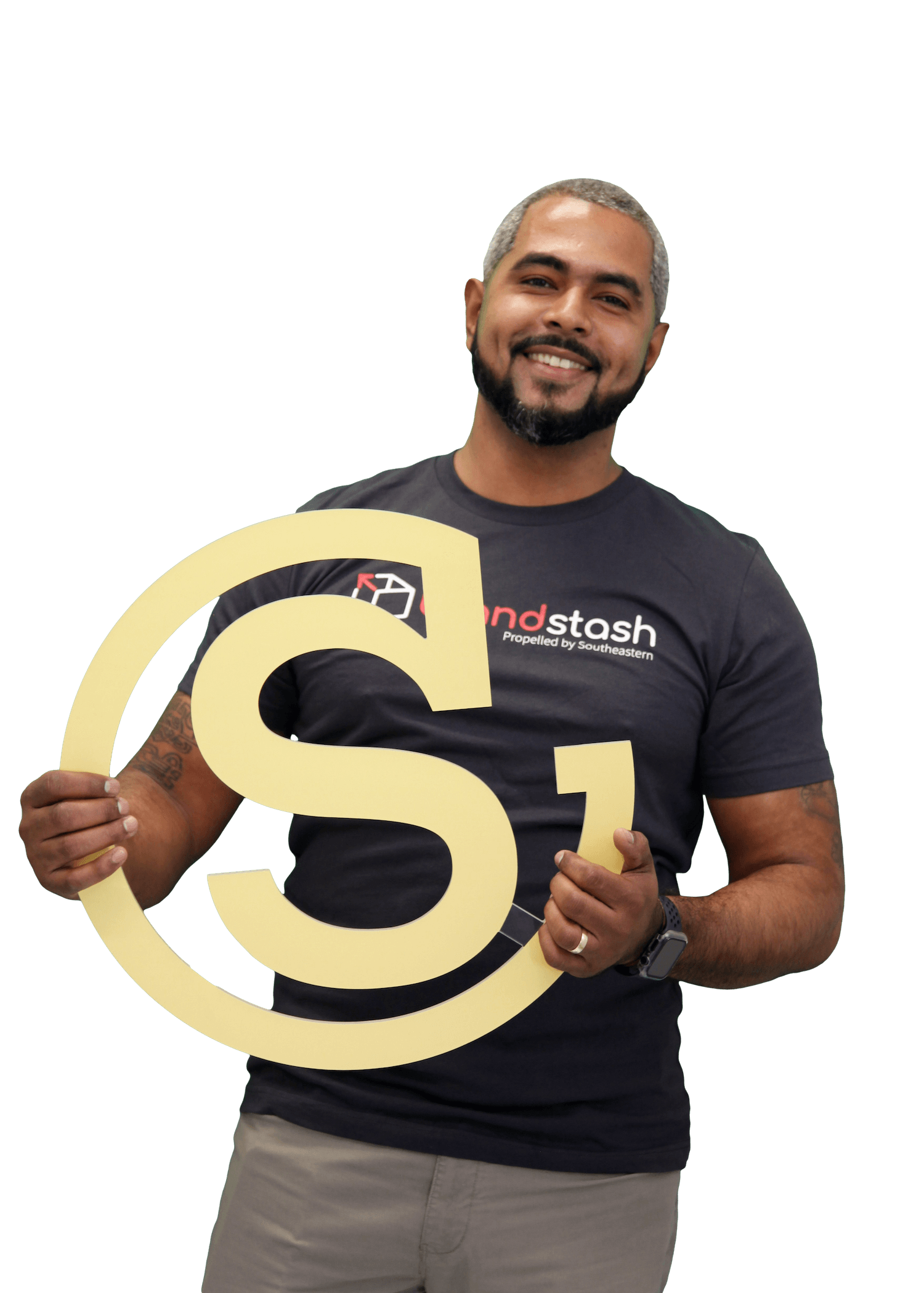 Employee holding a die cut Southeastern Printing logo and wearing a brandstash t-shirt-1