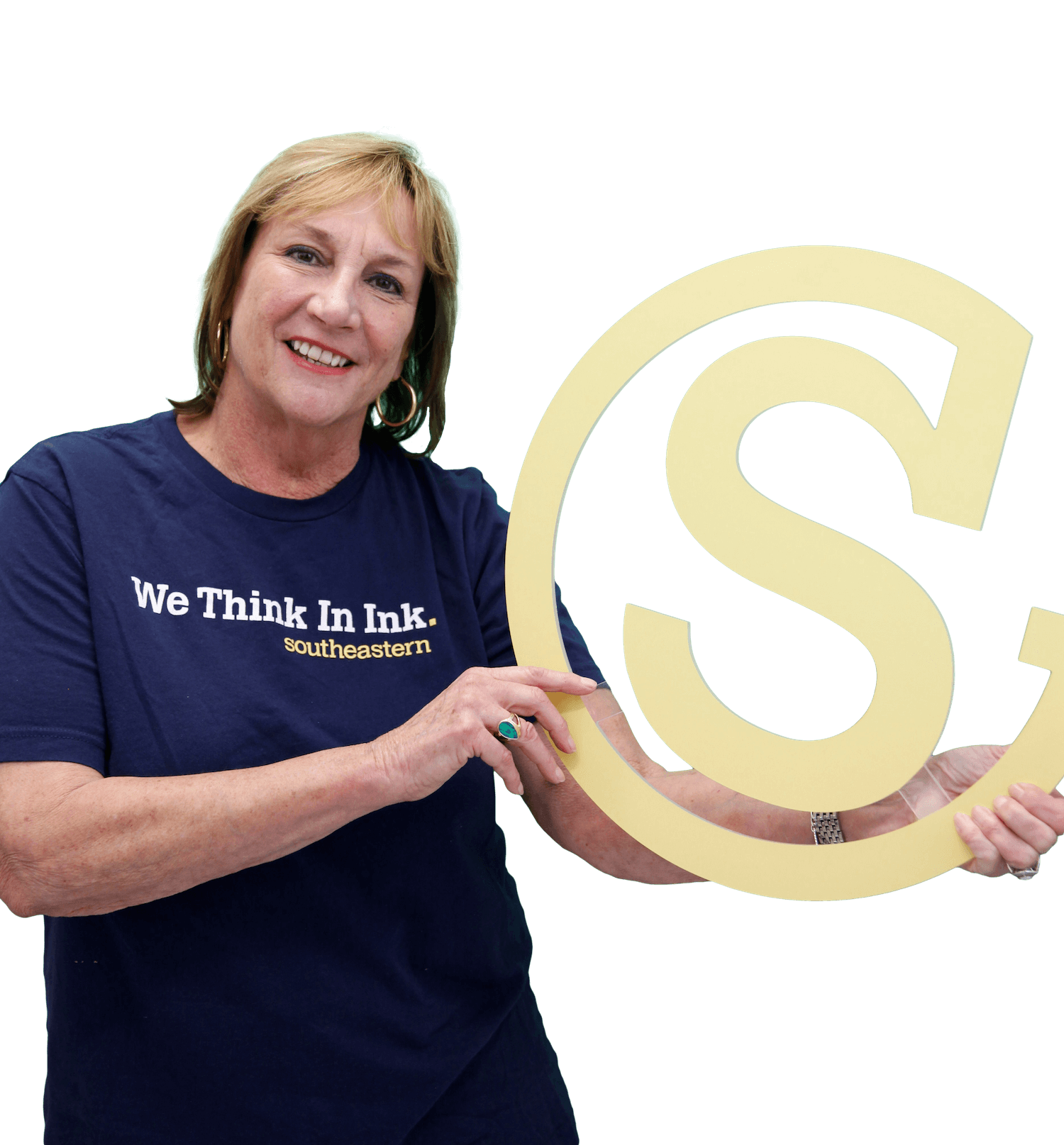 Southeastern Printing employee holding up a die cut company logo-1