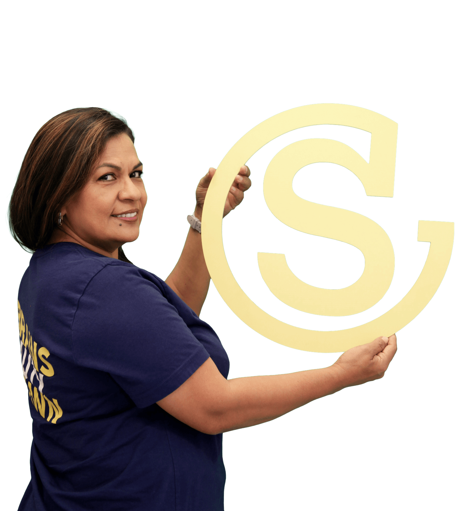 Southeastern employee holding a die cut company logo and smiling at camera-1