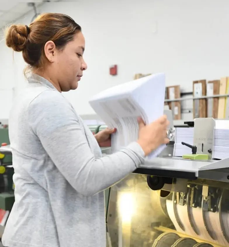 boombox-woman-stacking-prints