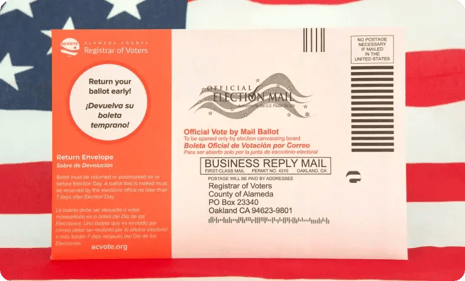 mail-in-ballot-postcard-on-american-flag-background