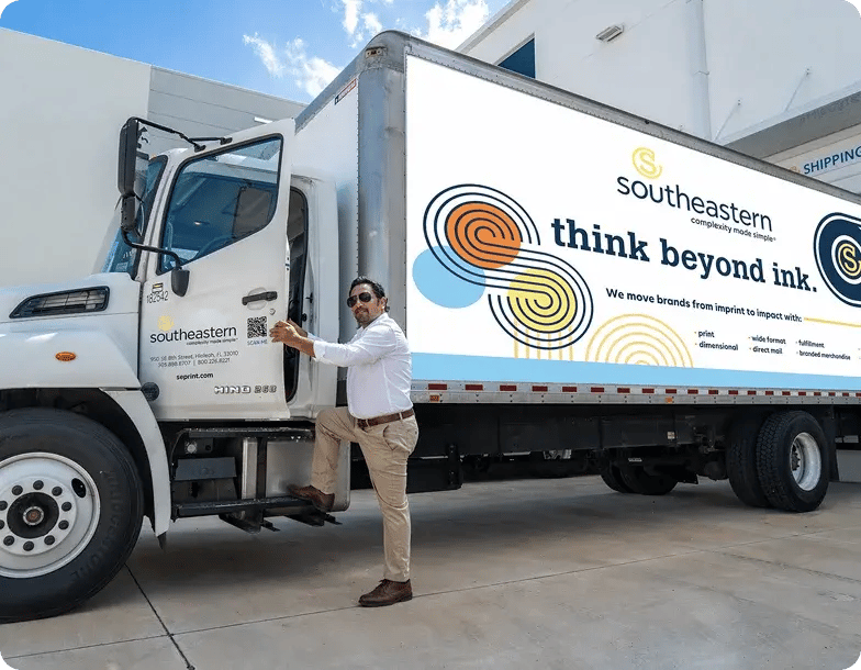 man-getting-into-branded-truck